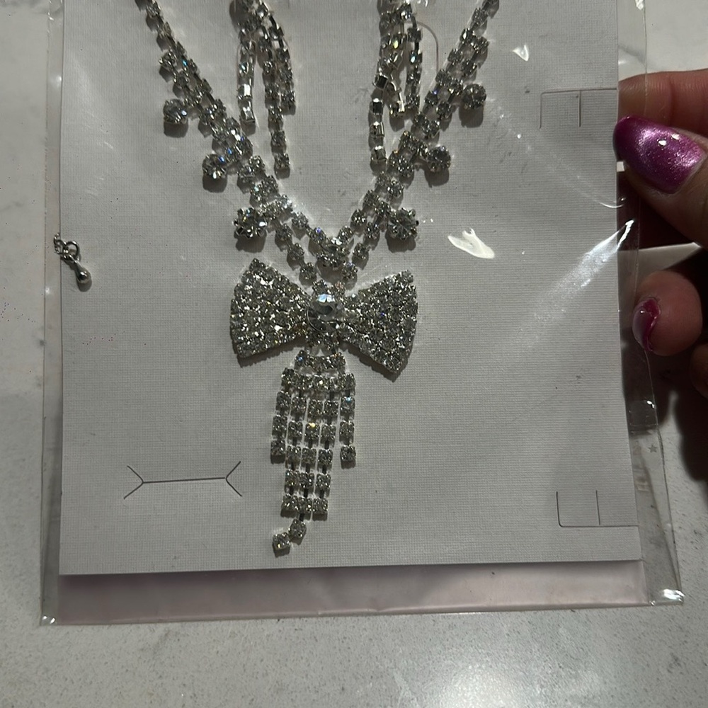 Elegant Silver Bow Necklace